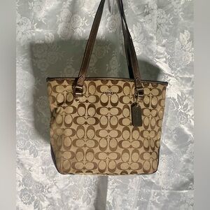 Coach Signature Jacquard Zip Top Bag 
10”x 13.5”x 4”